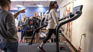 Health and Exercise Sciences students monitor people on treadmills